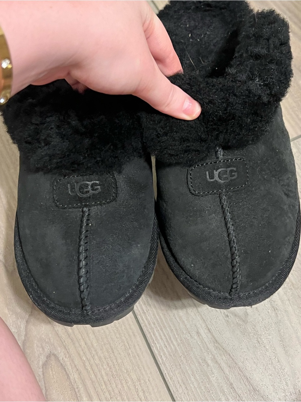 UGG women’s Black Faux-Shearling Slip-On Slippers